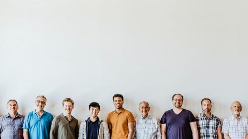 Cheerful diverse men standing in a line background - 2027817
