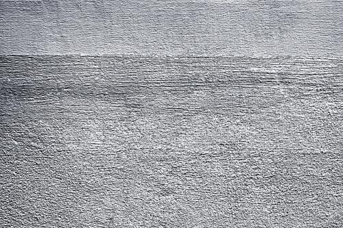 Roughly silver painted concrete wall surface background - 596874