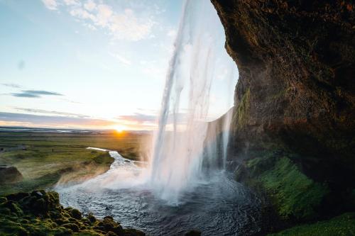 Back view of Seljalandsfoss waterfall in Iceland - 1206088
