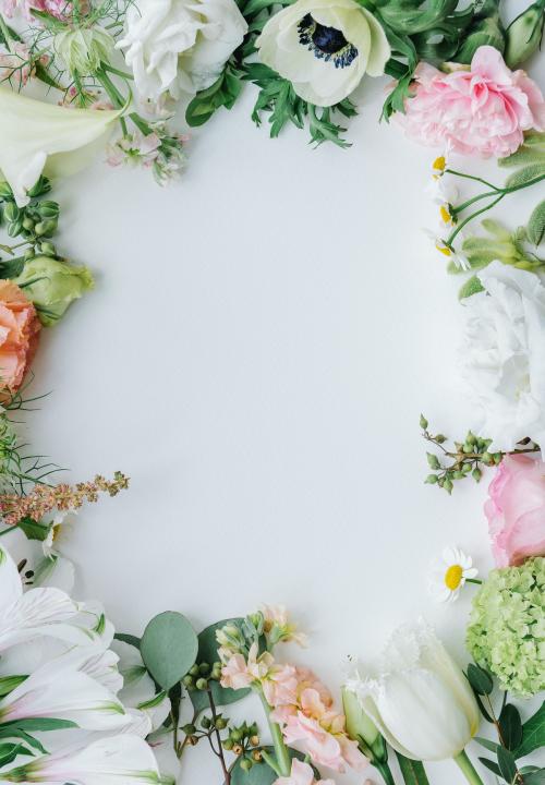 Fresh flowers frame on a white background - 1207727