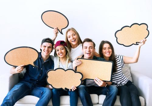 Happy young adults holding up copyspace placard thought bubbles - 383947