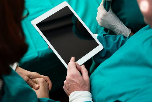 Doctors using digital tablet - 260738