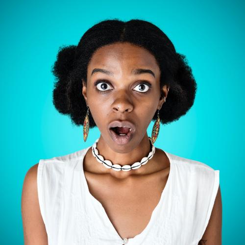 Black woman with a shocking facial expression - 2053925
