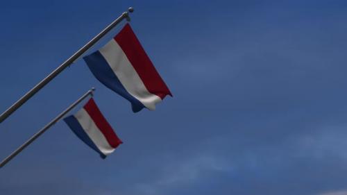 Videohive - Netherlands Flags In The Blue Sky - 4K - 34532810 - 34532810