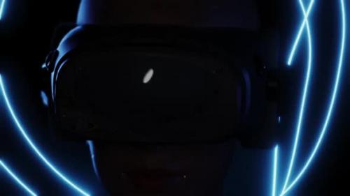 Videohive - portrait of a girl in a VR helmet. dynamic scene as a girl looks around while in virtual space - 35529796 - 35529796