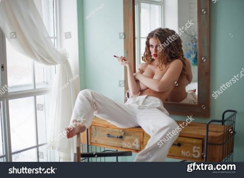 Beautiful sensual women in her boudoir - Stock Photos