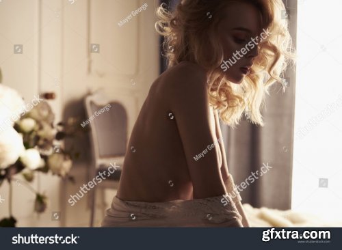Beautiful sensual women in her boudoir - Stock Photos