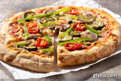 Vegetarian pizza with zucchini tomato peppers and mushrooms 
