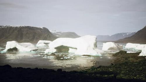 Videohive - Snowy Mountains and Drifting Icebergs in the Greenland Sea - 38950555 - 38950555