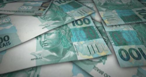 Videohive - Brazil Real 100 banknote flying over money surface - 41771155 - 41771155