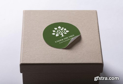 Realistic paper sticker mockup template on a box