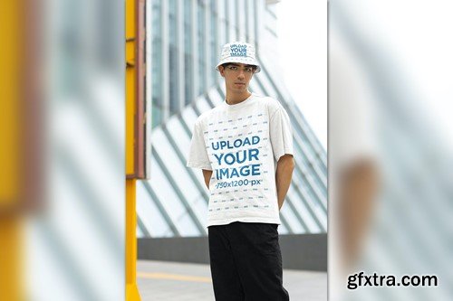T-Shirt and Bucket Hat Mockup Featuring a Man T-Shirt and Bucket Hat Mockup Featuring a Man