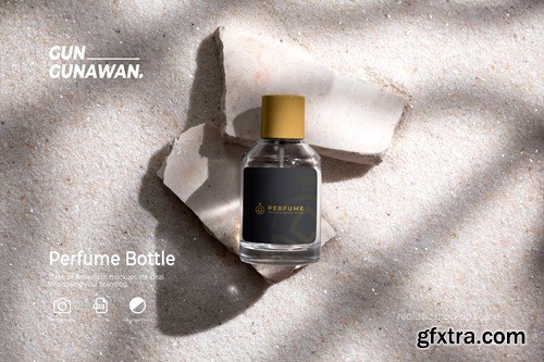 Perfume Bottle on Stone and White Sand Background 6E5R86U Perfume Bottle on Stone and White Sand Background 6E5R86U