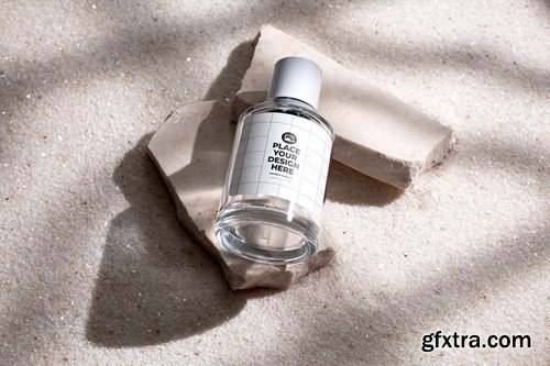 Perfume Bottle on Stone and White Sand Background 6E5R86U Perfume Bottle on Stone and White Sand Background 6E5R86U