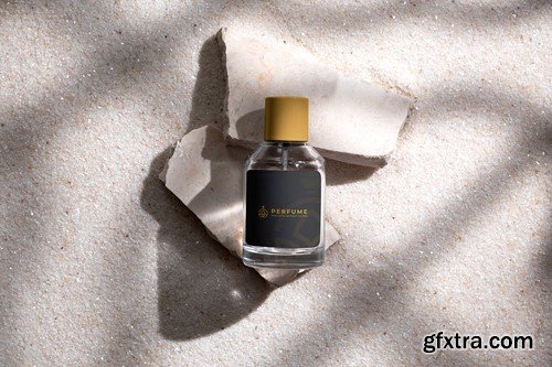 Perfume Bottle on Stone and White Sand Background 6E5R86U Perfume Bottle on Stone and White Sand Background 6E5R86U