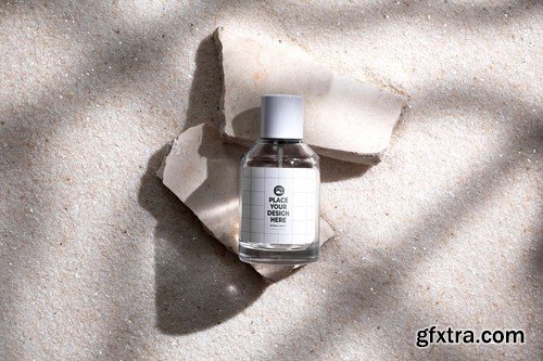 Perfume Bottle on Stone and White Sand Background 6E5R86U Perfume Bottle on Stone and White Sand Background 6E5R86U