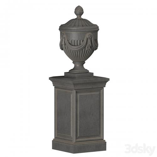 Classic vase on a pedestal for decoration of the facade and interior