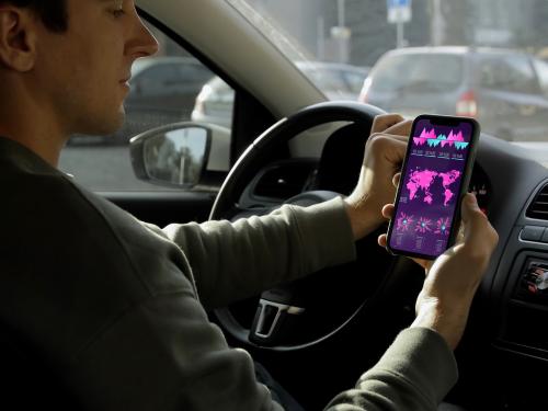 Man in the Car Watch on Phone Screen Mockup