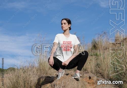 Mockup of woman wearing customizable sports t-shirt, crouching 799785595