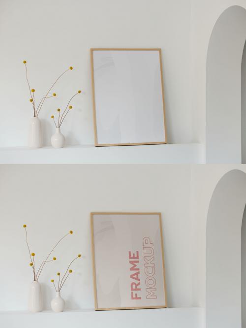 Wood Frame Mockup On a White Shelf With Natural Light