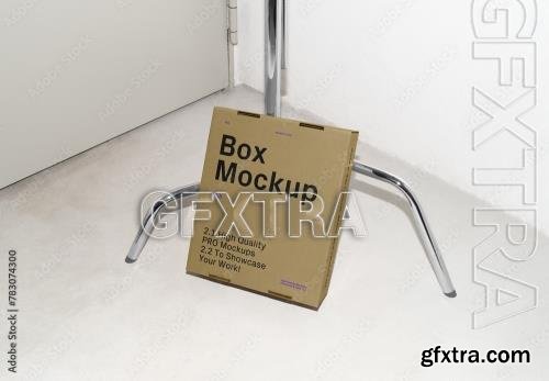 Cardboard Box Leaning against the Tripod Mockup 783074300