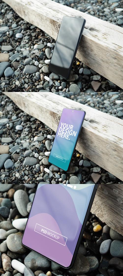 Modern Smartphone Mockup on the Rocks on the Beach