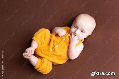 Small Child On A Brown Background 6xJPEG