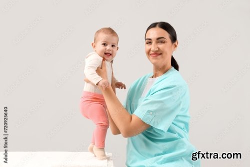 Female Pediatrician With Little Baby 6xJPEG