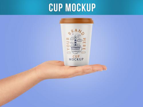 Cup in Woman's Hand Mockup